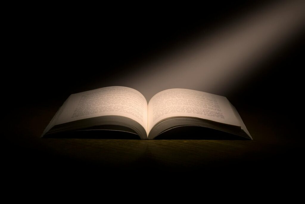 light shining down on book